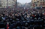38385928-9178825-Law_enforcement_officers_stand_in_front_of_participants_during_a-a-35_1611424409630